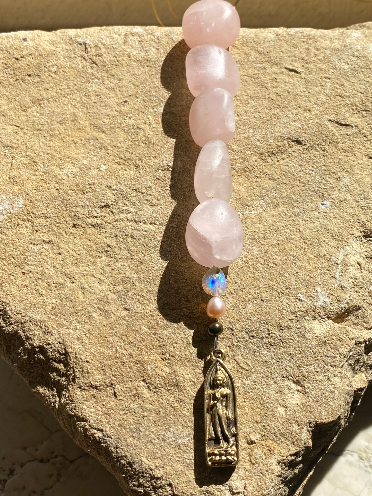 Walking Buddha Opal Rose Sun Catcher