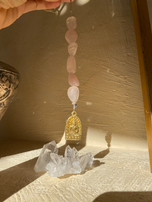 Attrape-soleil en quartz rose et bouddha en cristal